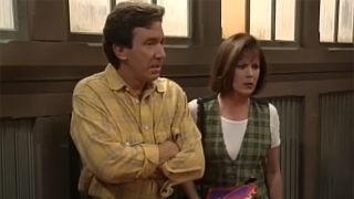 Tim Allen and Patricia Richardson argue in the garage in Home Improvement.