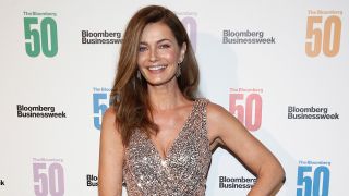 Paulina Porizkova attends red carpet for The Bloomberg 50 in sparkly silver dress.